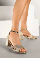 Goldene Glitzersandalen mit Blockabsatz