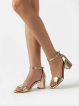 Goldene Pumps mit Blockabsatz