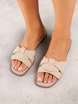 Beige flache Pantoletten